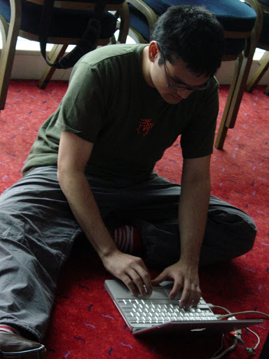 Josh coding on laptop